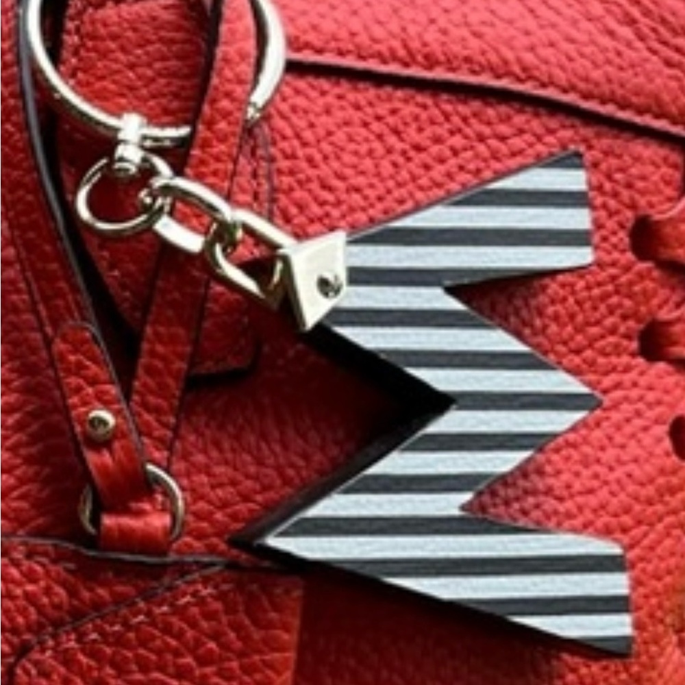 Henry Bendel Red Textured Handbag with Striped Keychain